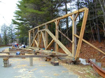 The first of the two trusses complete and standing. Photo
by Joe Nelson, April 19, 2002