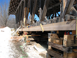 Cribbing supporting the Sanborn Bridge
